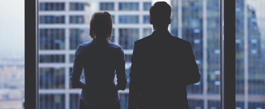 couple looking out window