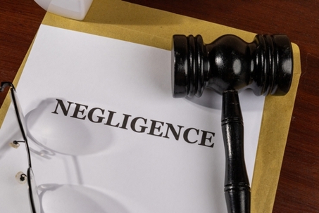 Negligence Title on Legal Documents Set on Desk – Legal Concept