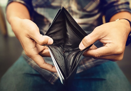 person opening empty wallet